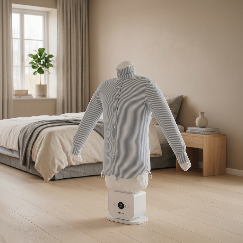 Aironox HOME with a shirt in a softly lit bedroom